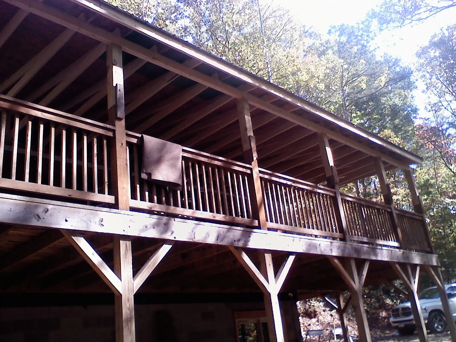 Timber framing under a new elevated porch and deck — Roof Leak Repair in East Meadow by Roofing Brothers